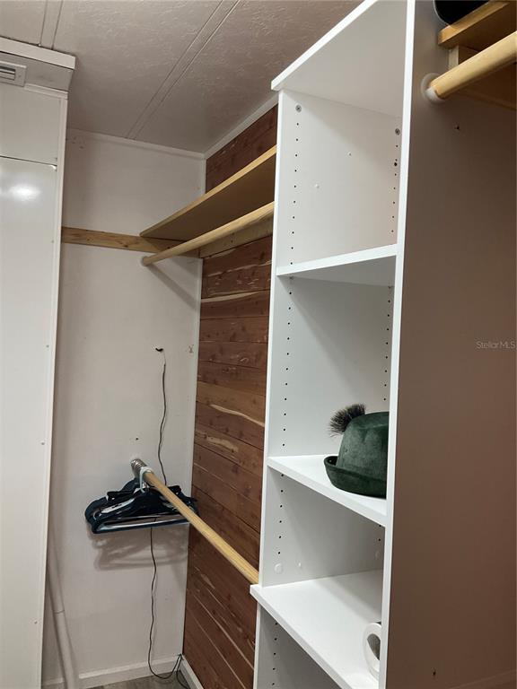 1558 Chobee Street Okeechobee, FL 34974 - Photo 59 of 63 a view of walk in closet