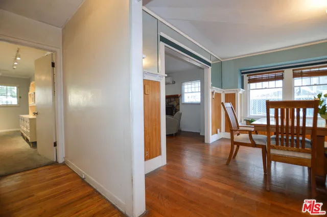 a view of a livingroom with furniture and wooden floor