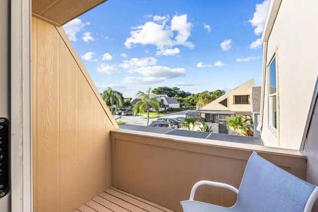 a bathroom with a sink mirror and vanity
