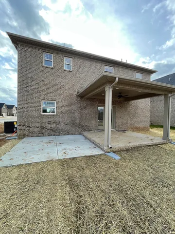 a bathroom with double vanity sink and a mirror