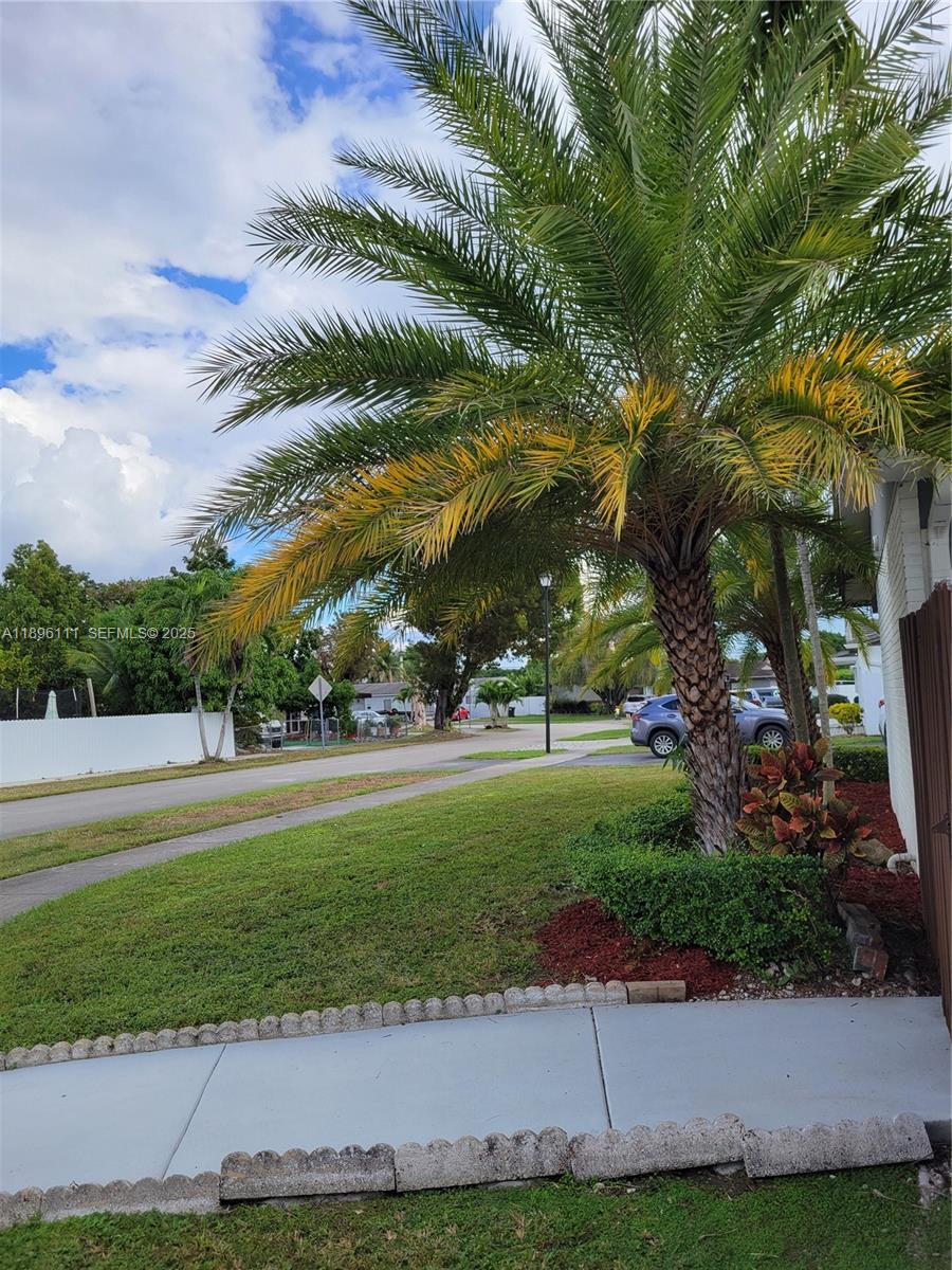12764 Southwest 46th Lane, Unit 12764 Miami, FL 33175 - Photo 8 of 13 a view of outdoor space yard and green space
