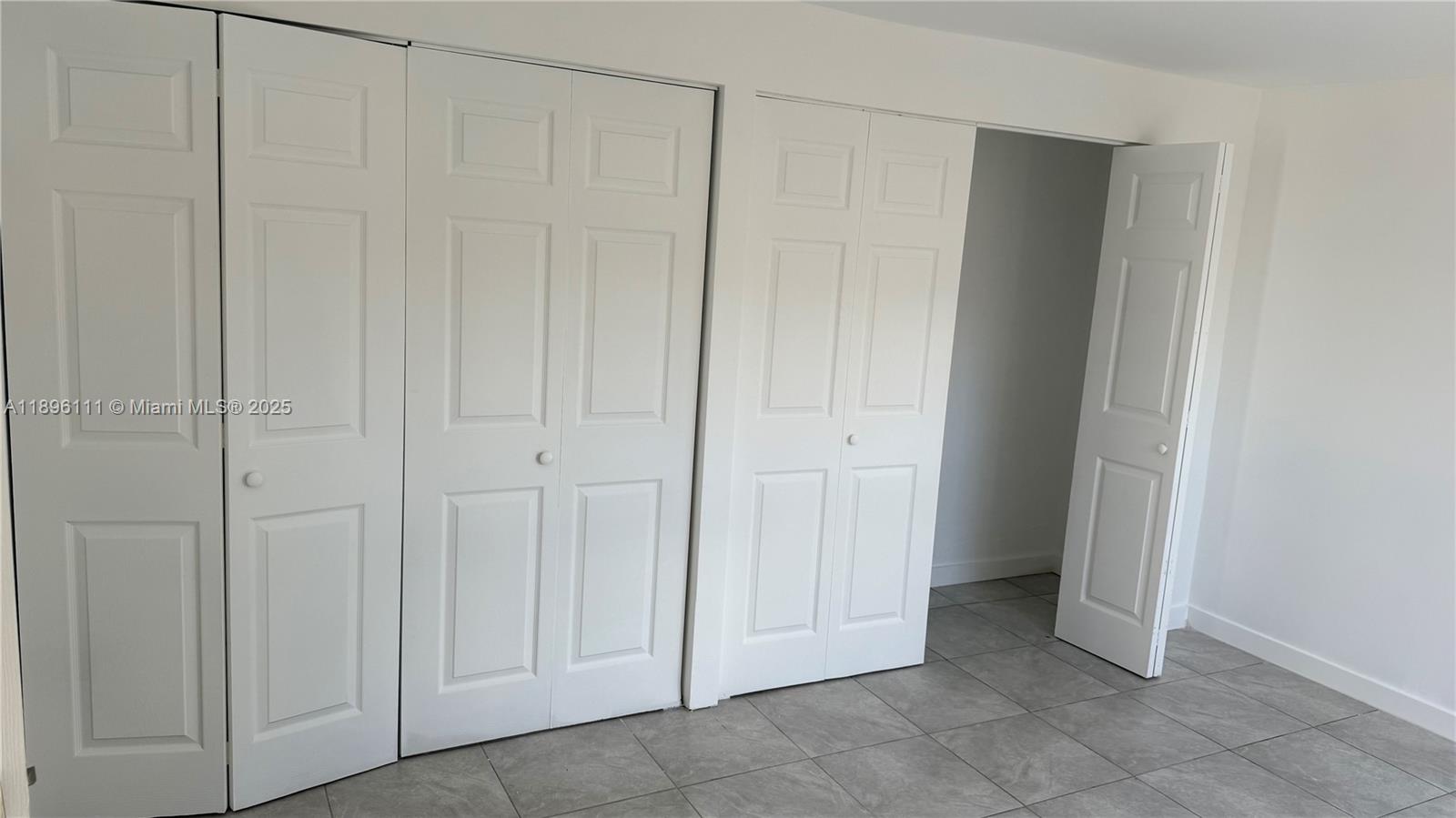 12764 Southwest 46th Lane, Unit 12764 Miami, FL 33175 - Photo 9 of 13 a view of an empty room