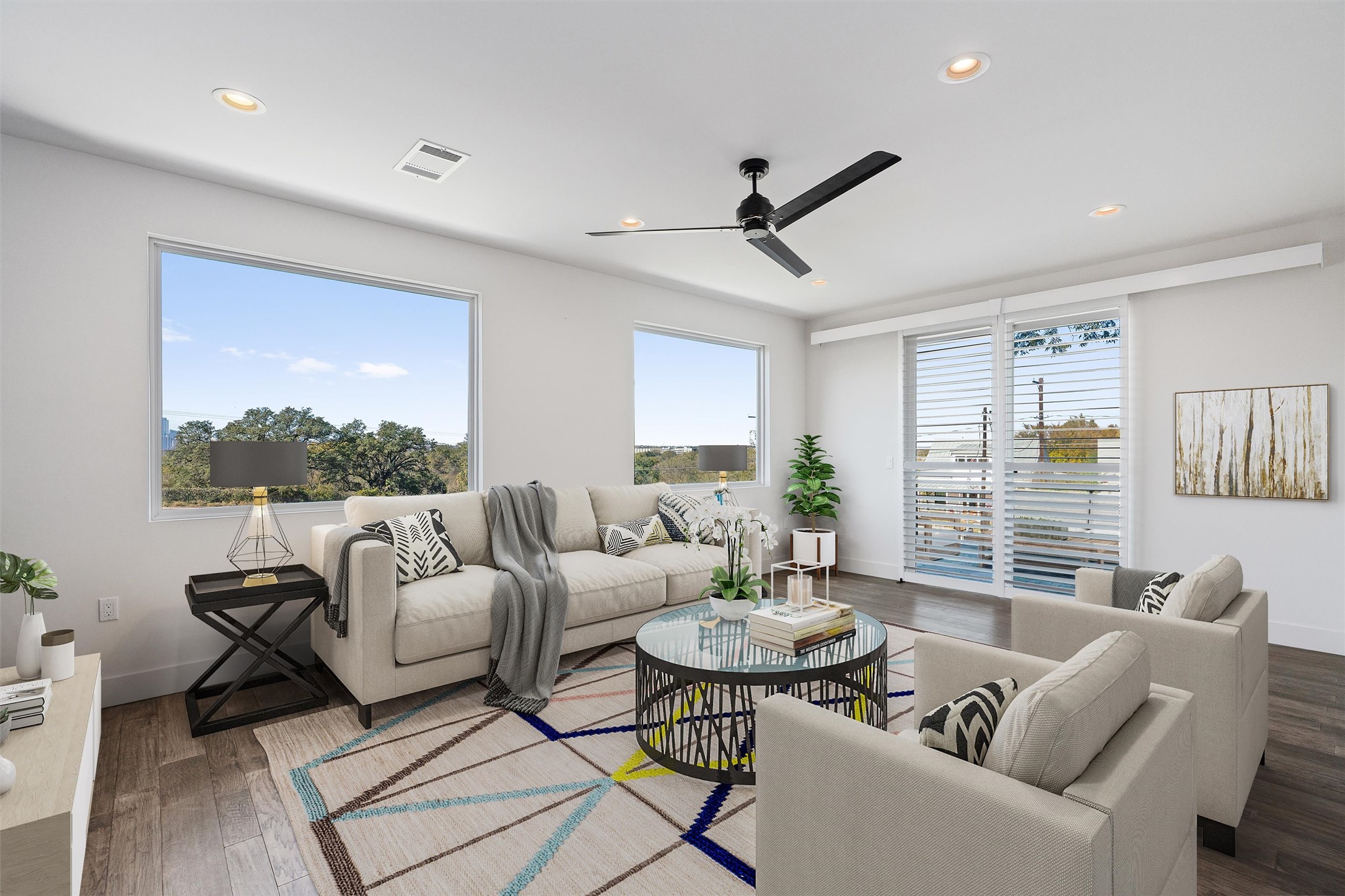 6217 Clovis Street, Unit A Austin, TX 78741 - Photo 10 of 28 Living area with wood finished floors, a ceiling fan, and recessed lighting