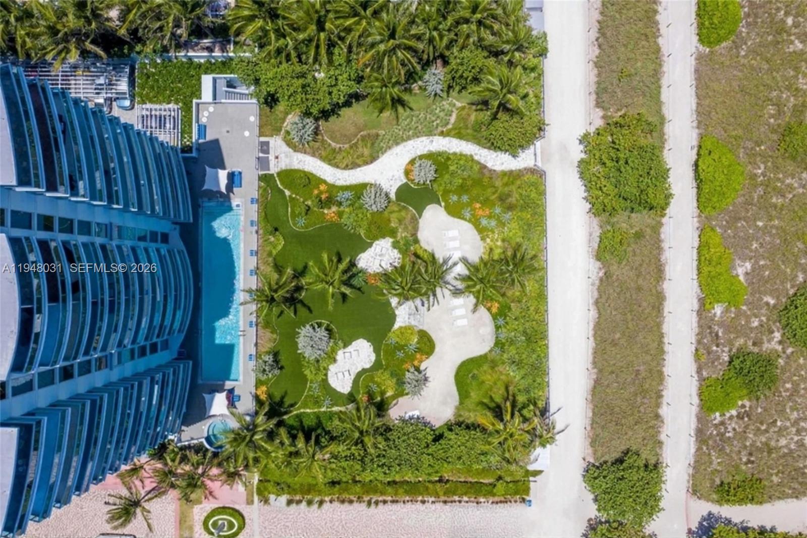 9401 Collins Avenue, Unit 401 Surfside, FL 33154 - Photo 24 of 28 a view of a flower in a garden