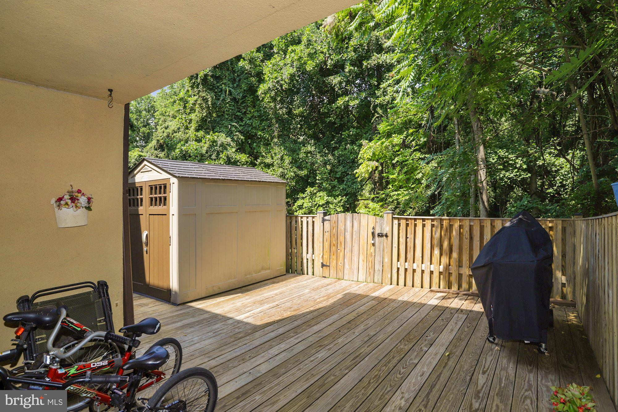9768 Basket Ring Road Columbia, MD 21045 - Photo 25 of 27 Rear deck and shed