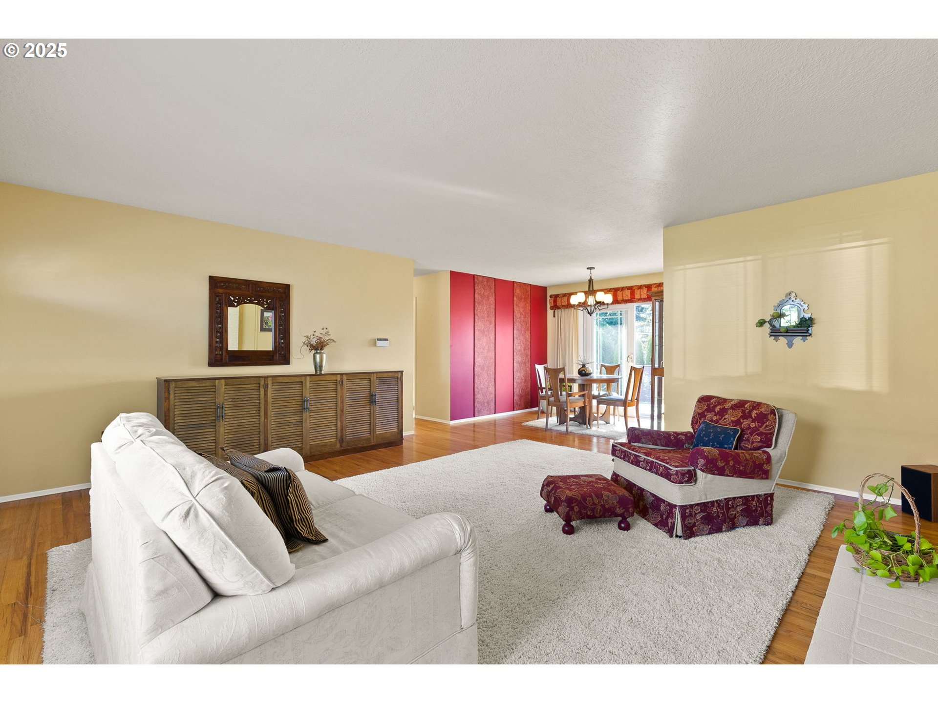 1055 Southeast 214th Avenue Gresham, OR 97030 - Photo 11 of 38 a living room with furniture and wooden floor