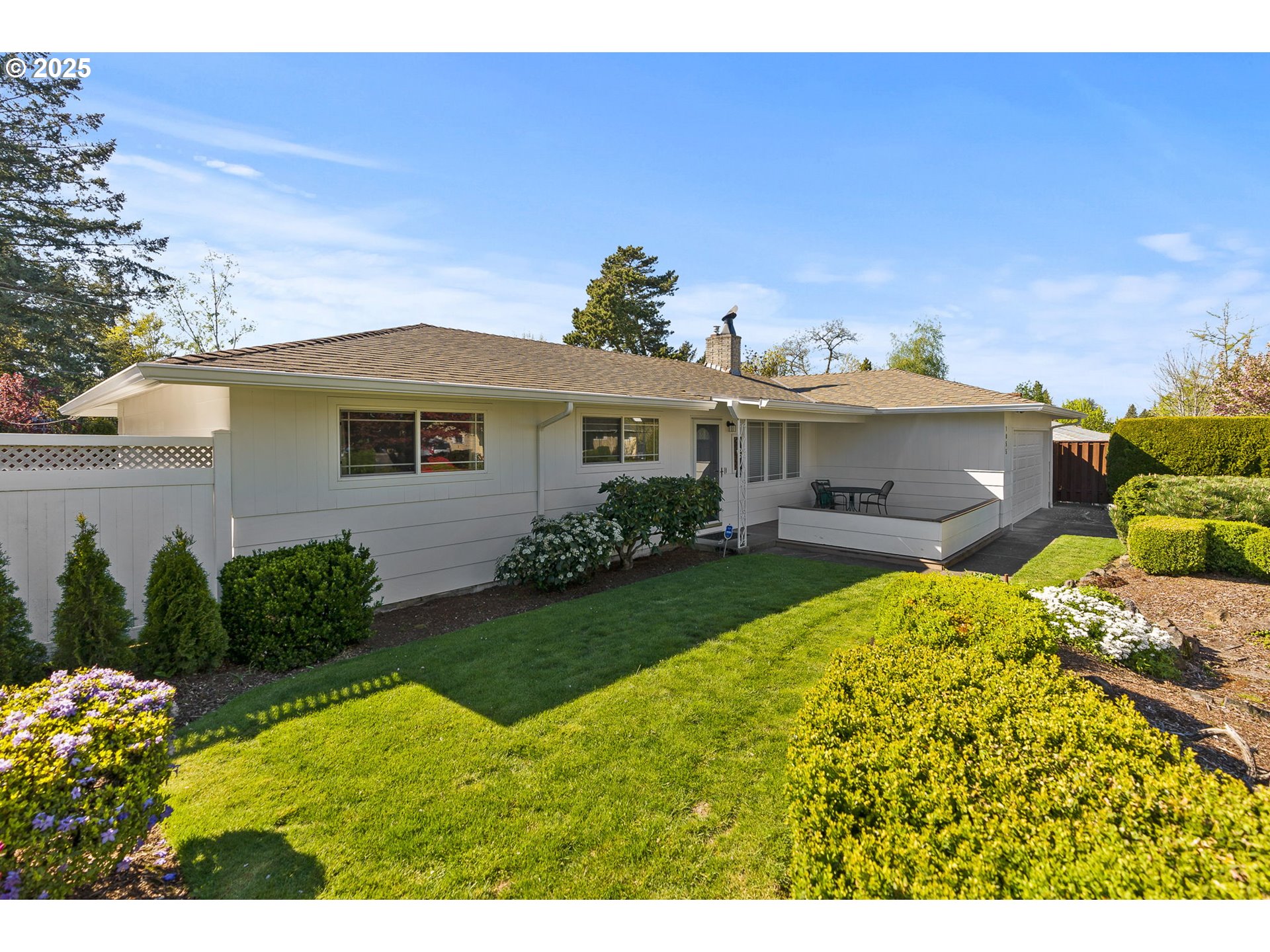 1055 Southeast 214th Avenue Gresham, OR 97030 - Photo 2 of 38 a view of a house with a yard