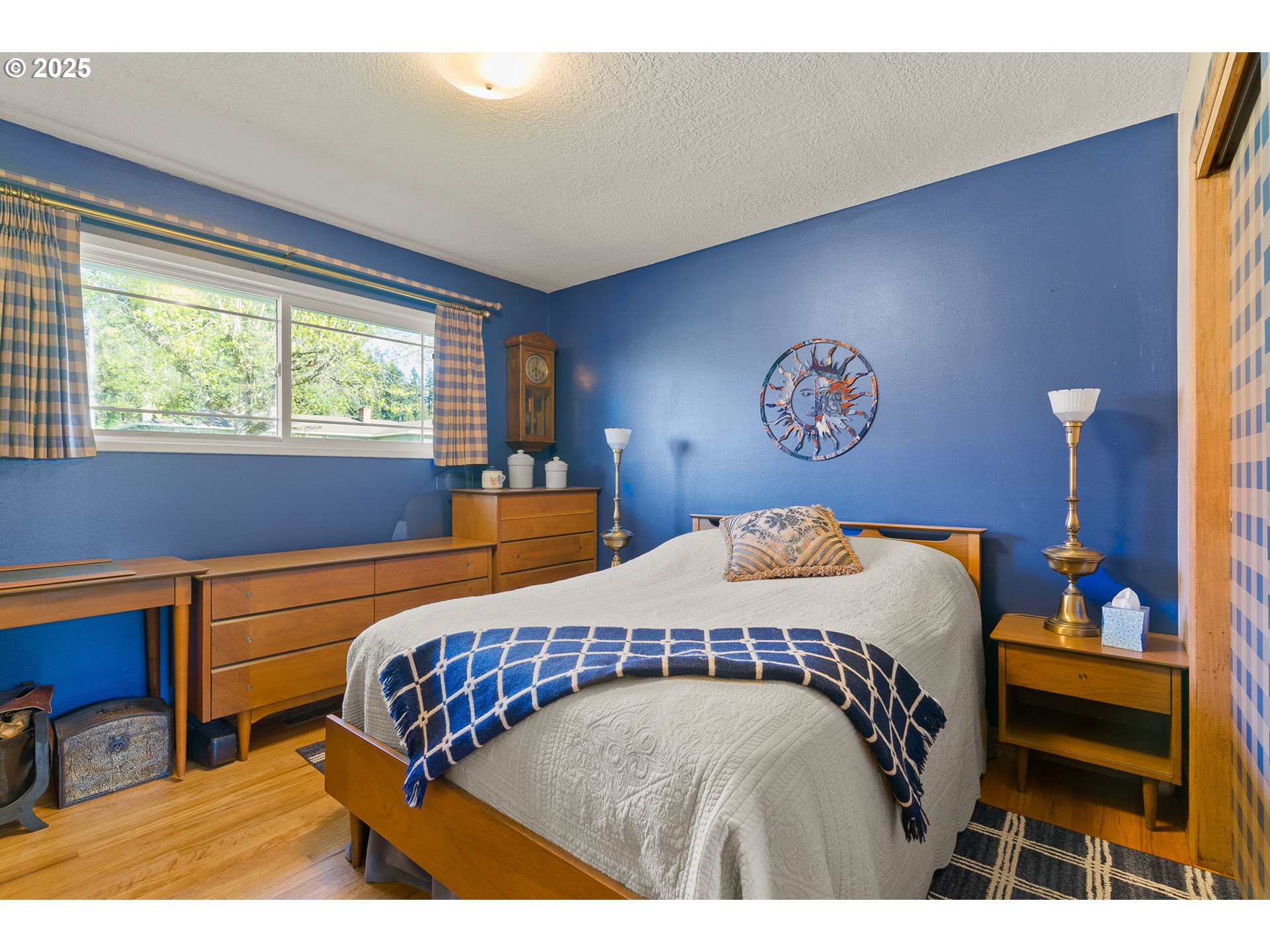 1055 Southeast 214th Avenue Gresham, OR 97030 - Photo 26 of 38 a bedroom with a bed and a window