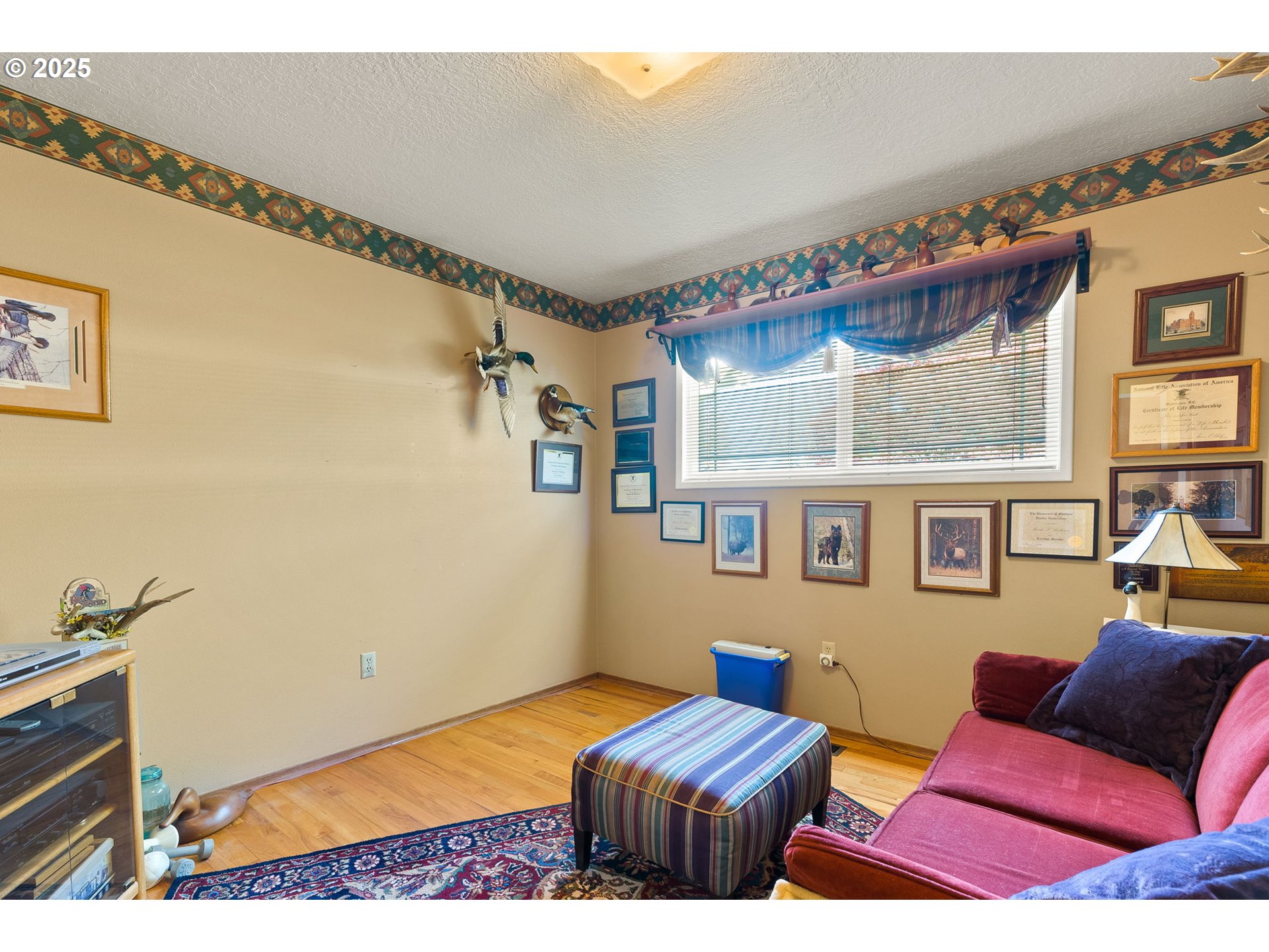 1055 Southeast 214th Avenue Gresham, OR 97030 - Photo 28 of 38 a bedroom with furniture and a window