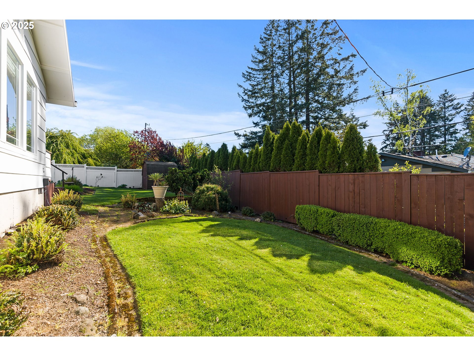 1055 Southeast 214th Avenue Gresham, OR 97030 - Photo 37 of 38 a view of backyard with swimming pool and outdoor seating