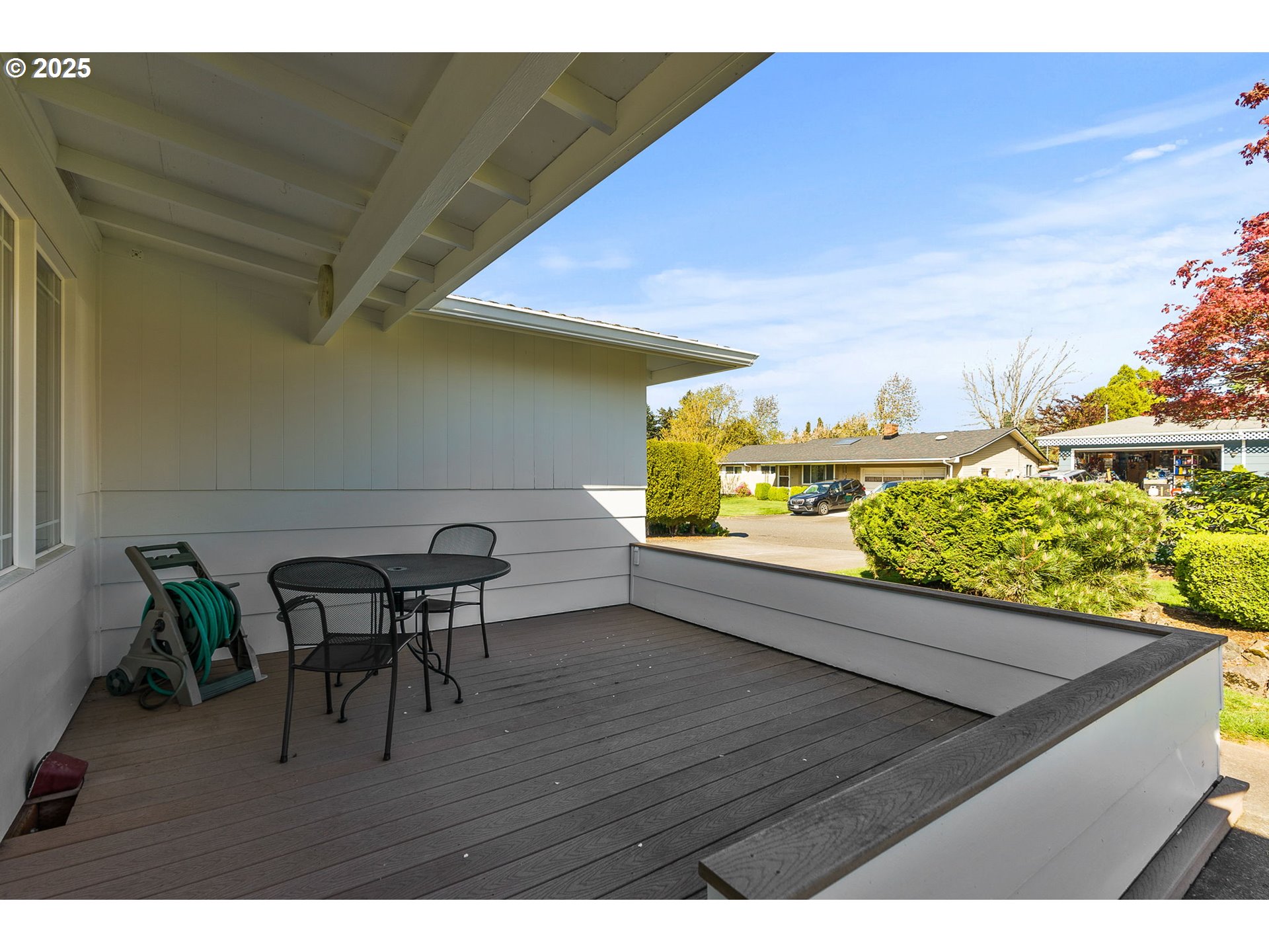 1055 Southeast 214th Avenue Gresham, OR 97030 - Photo 6 of 38 a view of a terrace with furniture and a potted plant