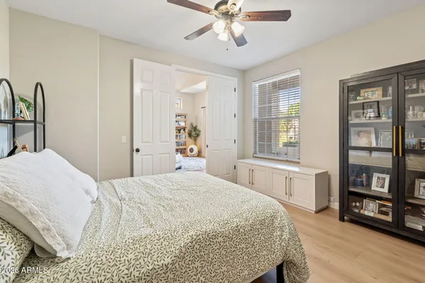 a spacious bathroom with a tub shower and sink