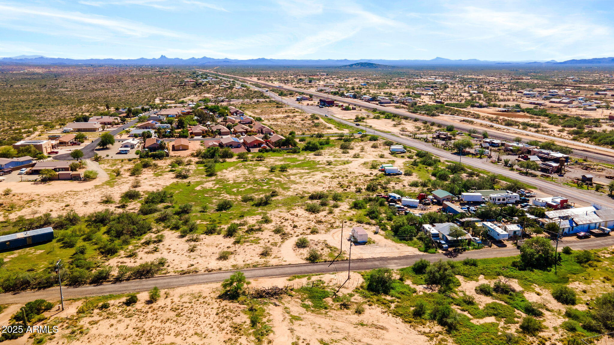 22055 Sunrise Road Congress, AZ 85332 - Photo 3 of 20 an aerial view of residential building and parking space