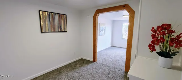 a view of a hallway with entryway