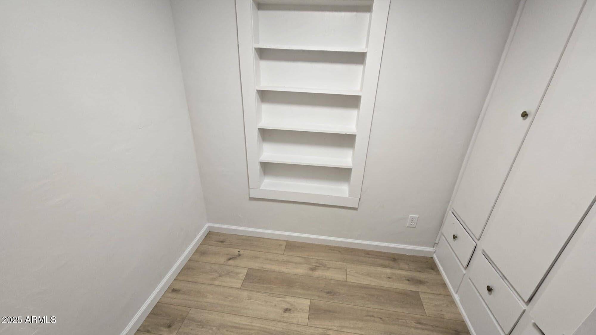 5214 Sour Dough Road Snowflake, AZ 85937 - Photo 25 of 30 a view of a room with rack on the wall and a window