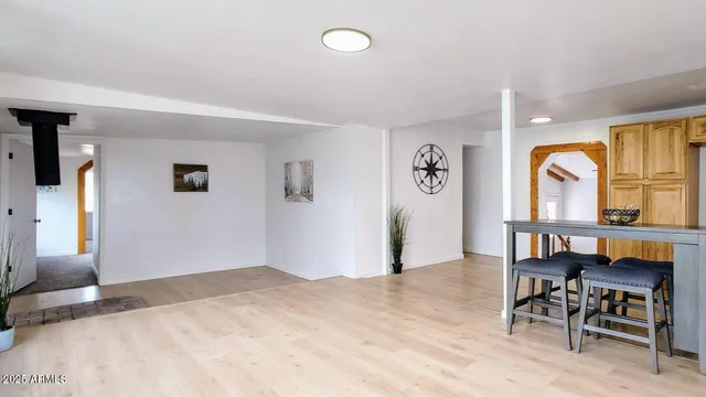 a bedroom with furniture and a window