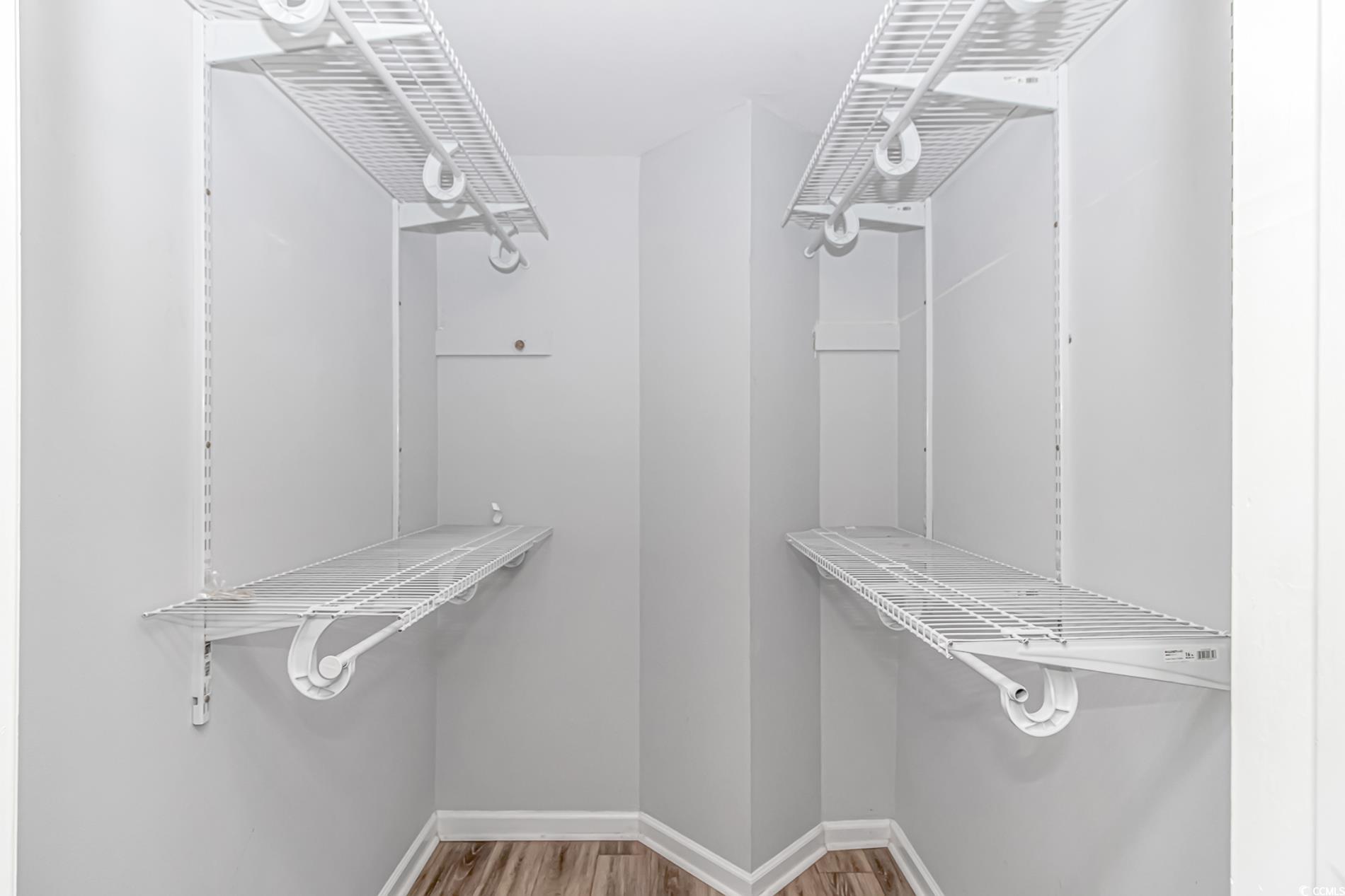 2829 Highway 129 Galivants Ferry, SC 29544 - Photo 19 of 40 Walk in closet featuring wood finished floors