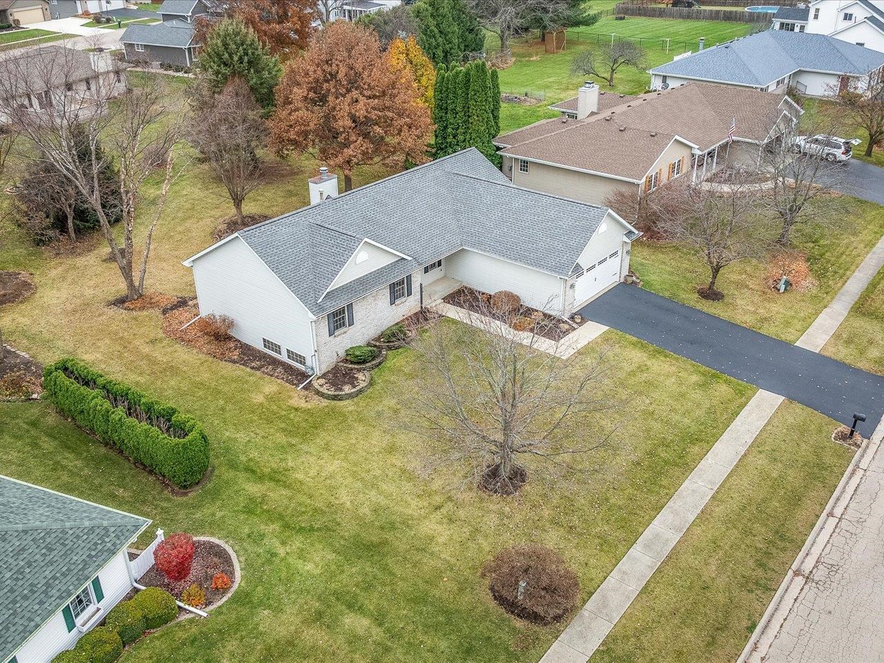 919 Gregory Way Winnebago, IL 61088 - Photo 39 of 47 a view of a house with a yard