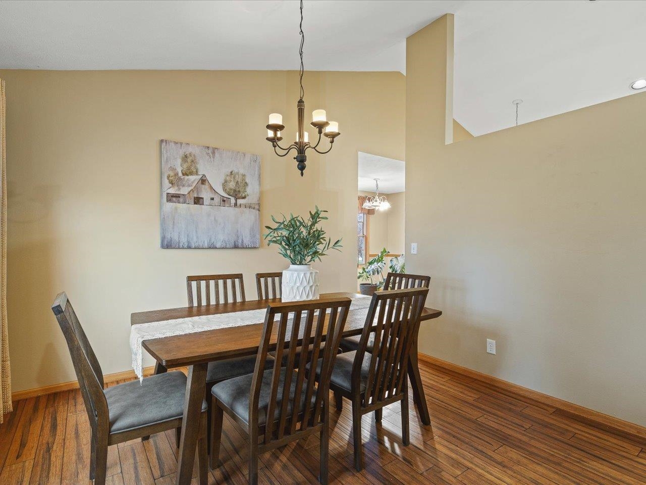 919 Gregory Way Winnebago, IL 61088 - Photo 8 of 47 a view of a dining room with furniture wooden floor and a chandelier