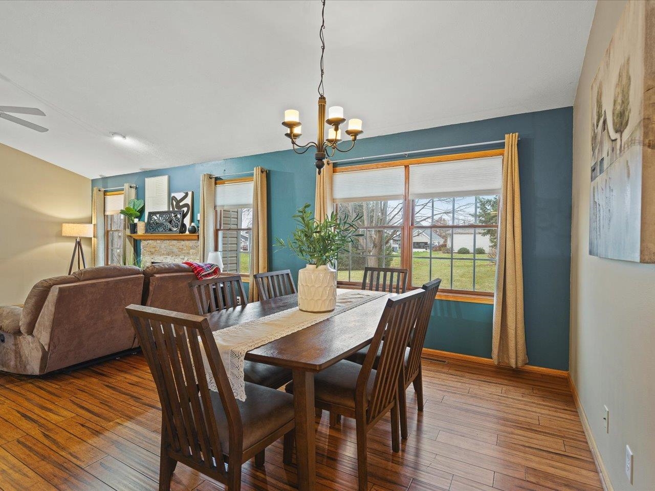 919 Gregory Way Winnebago, IL 61088 - Photo 9 of 47 a view of a dining room with furniture window and wooden floor