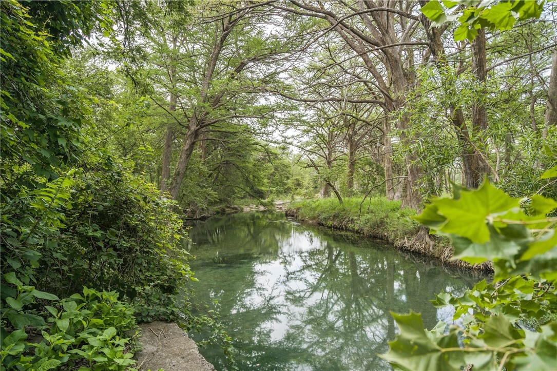 434 River Road Utopia, TX 78884 - Photo 1 of 1 a view of lake with green space
