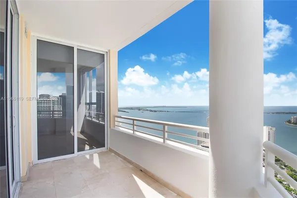 a view of a living room with a large window