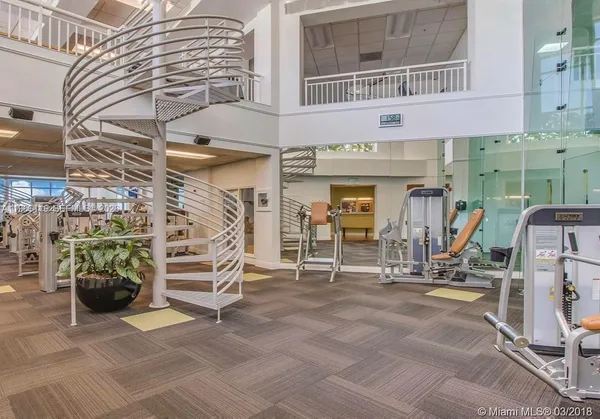 a view of a living room with furniture