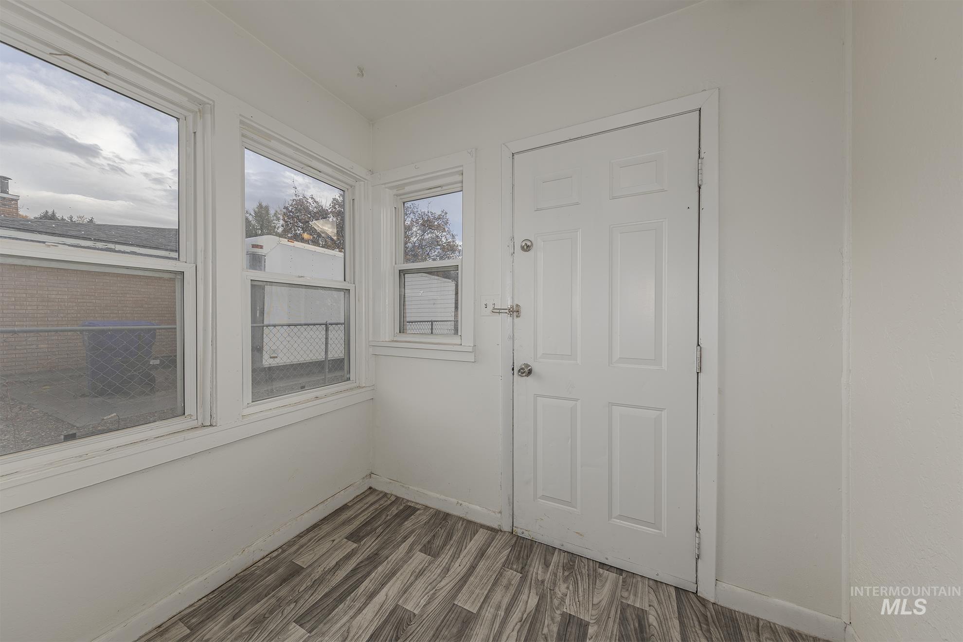 1602 2nd Avenue South Payette, ID 83661 - Photo 19 of 28 Doorway featuring wood finished floors and baseboards