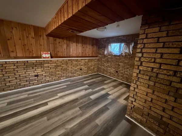 a view of a room that has a washer and dryer