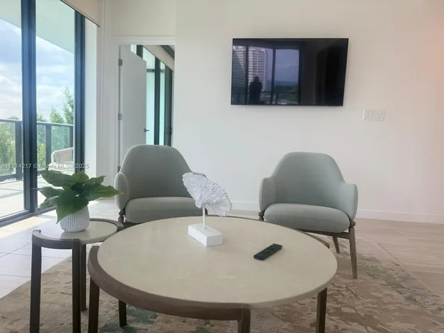 a view of a city with tall buildings