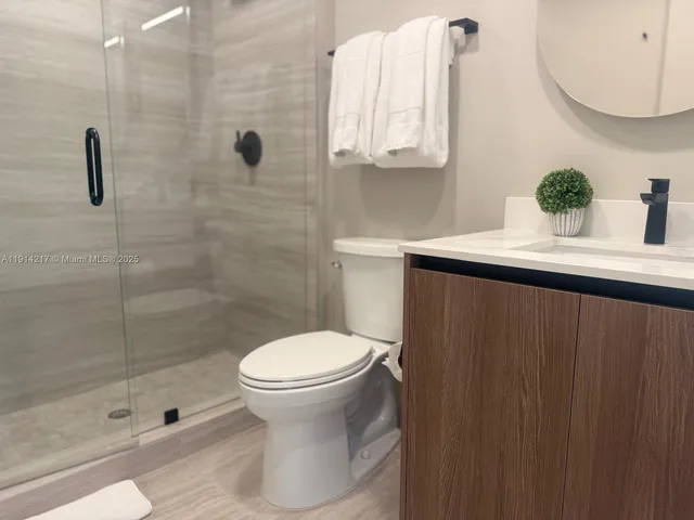 a kitchen with sink cabinets and window