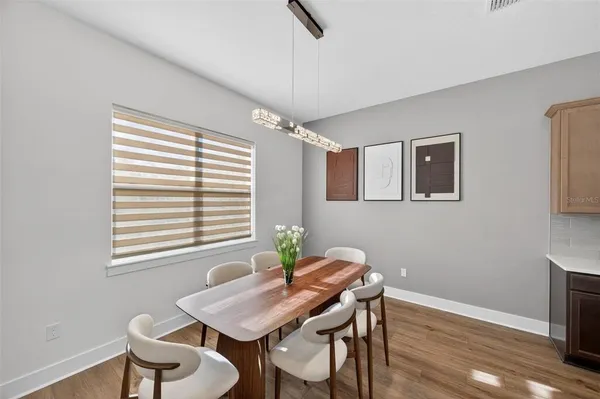 a room with a desk and a window