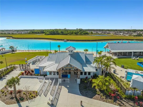 an aerial view of a house with a ocean view