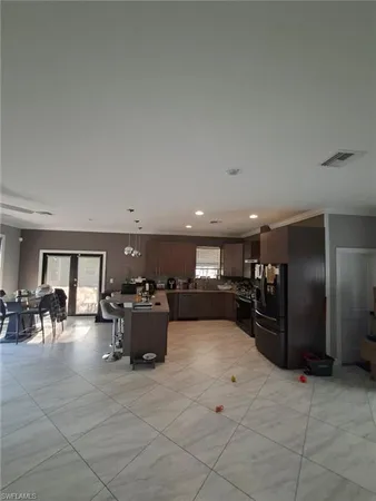 a bathroom with a sink mirror vanity and toilet