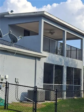 a car parked in front of a house