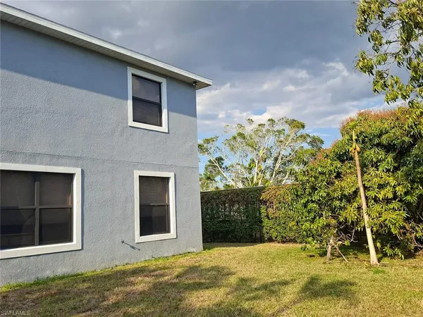 a house view with a garden space