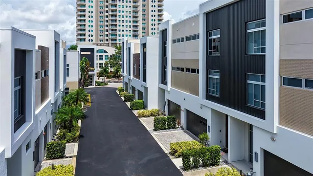 a narrow alley leading to a building