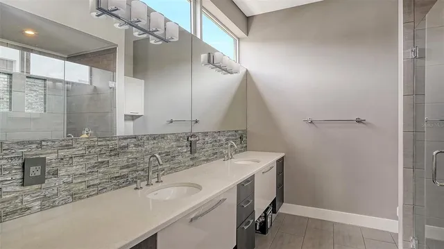 a balcony with table and chairs