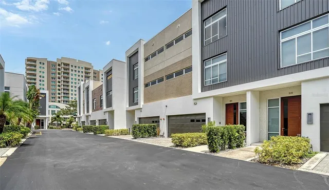 a front view of a multi story residential apartment building