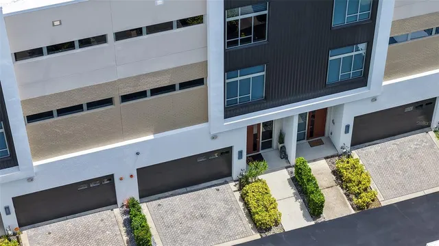 a brick building with a sign on it