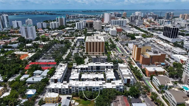 a sign that is on a wall next to a blue wall