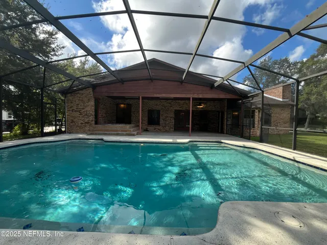 a outdoor space with lots of furniture and chandelier