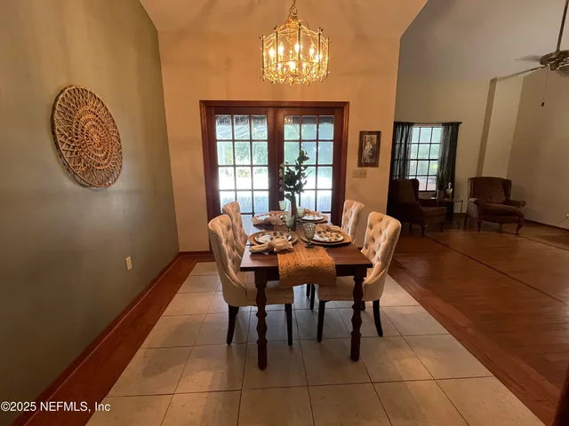 a kitchen with a stove a sink and a microwave