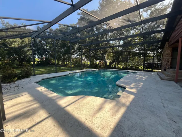 a view of a backyard with a garden