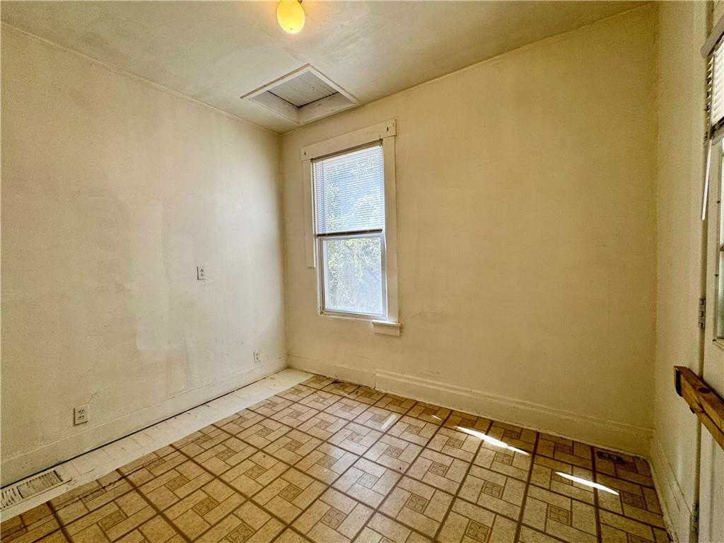 299 Stone Quarry Road Monaca, PA 15061 - Photo 13 of 27 a view of an empty room and window