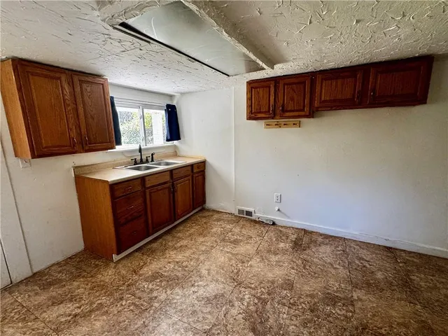 a view of kitchen with furniture