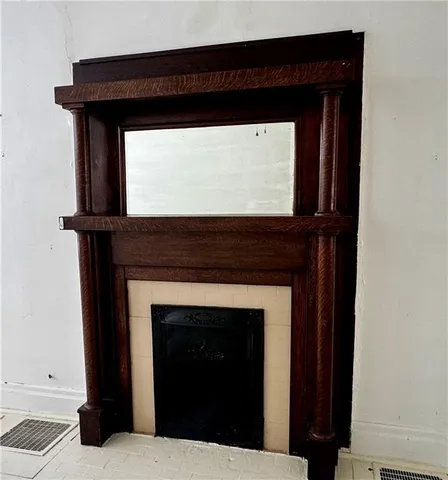 a living room with a fireplace