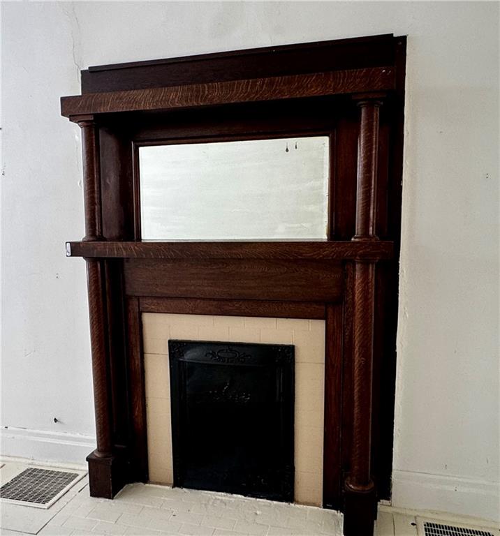 299 Stone Quarry Road Monaca, PA 15061 - Photo 7 of 27 a living room with a fireplace