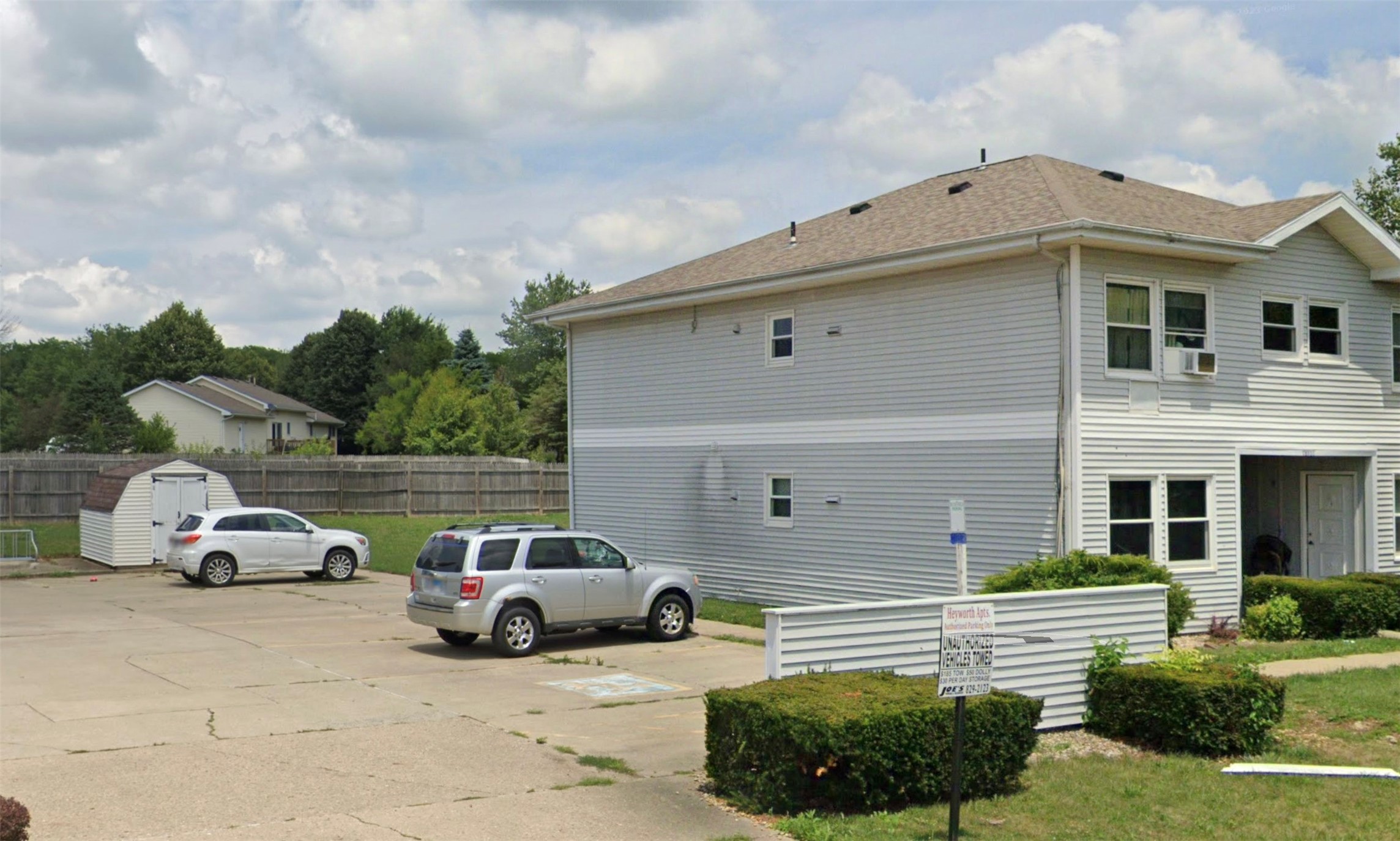 306 Wigwam Street Heyworth, IL 61745 - Photo 3 of 7 a car parked on the side of the road