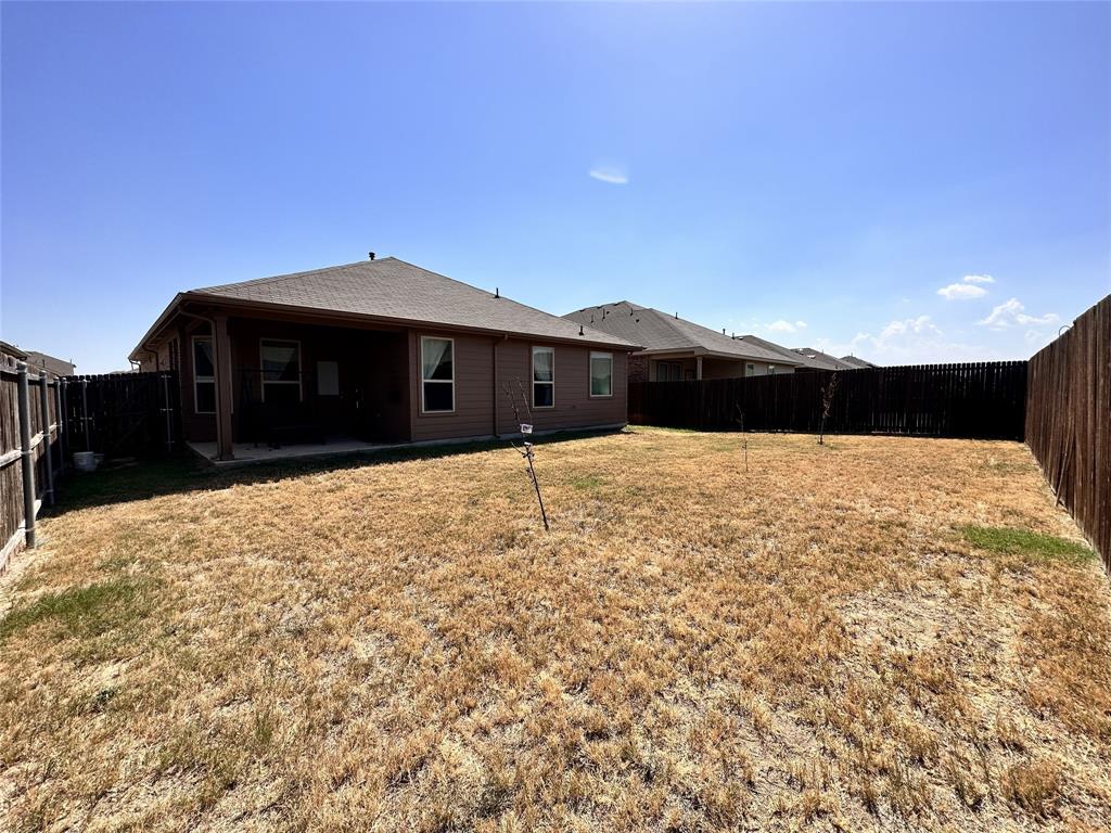 304 Cypress Crk Lane Denton, TX 76210 - Photo 20 of 24 a front view of a house with a yard